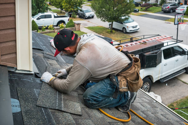 Professional Roofing technician working in Roslyn Heights, NY